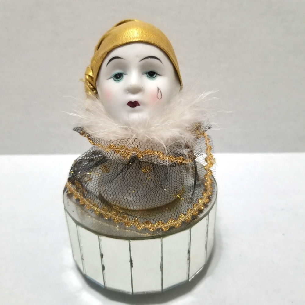 Vintage porcelain clown music box